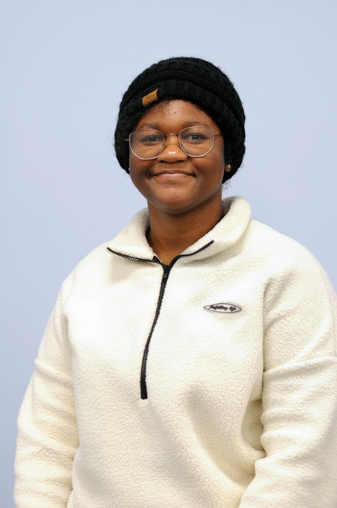 A student smiling at school